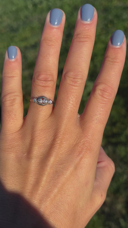 Dainty four-stone diamond ring