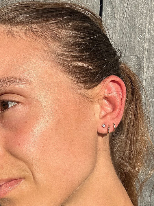 ESTATE DIAMOND STUDS IN 9CT GOLD