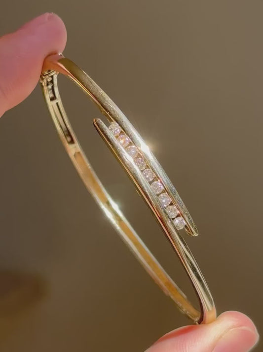 ESTATE 9CT GOLD AND DIAMOND BANGLE