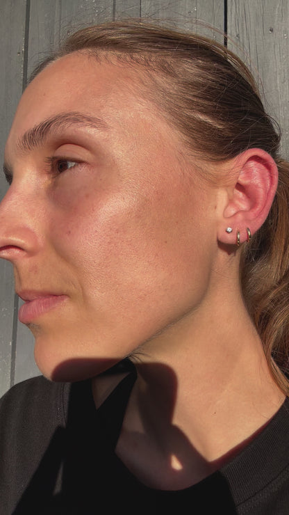 ESTATE DIAMOND STUDS IN 9CT GOLD